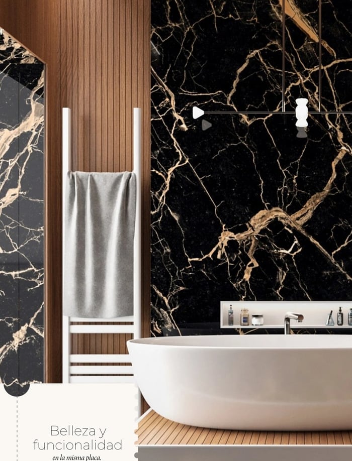 Muro de baño en porcelanato negro con veta dorada y mueble de madera
