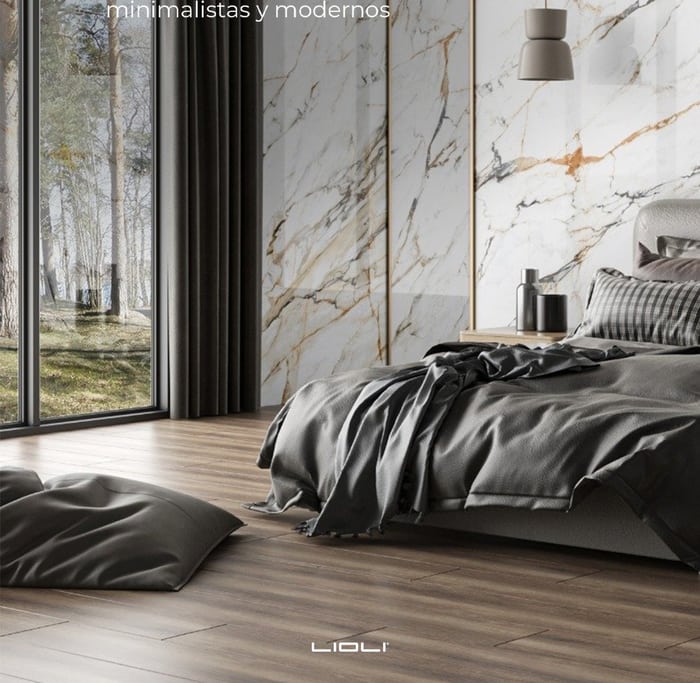 Recámara con muro de porcelanato blanco con veta dorada de piso a techo
